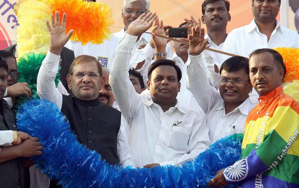 Janata Dal United leader Sharad Yadav being garlended during a public meeting and inaugural function of Bahujan Republican socialist party ( BRSP ) at Jambori Maidan, Worli, in Mumbai.