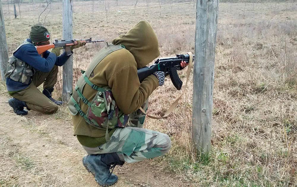 Special Operation Group (SOG) personnel take positions during a Armys massive search operation against the militants hiding in Baban Rajwar Forest area of Handwara.