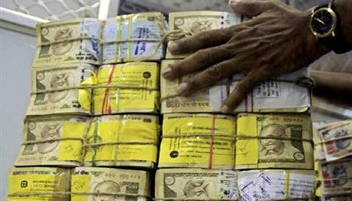 Rupee up 7 paisa against dollar in early trade