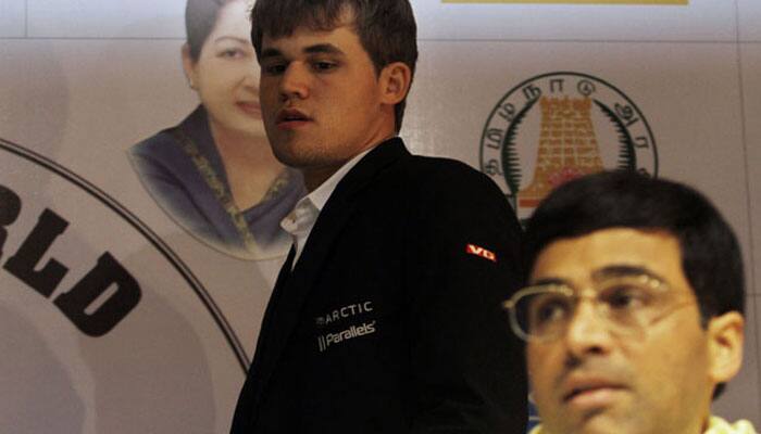 London Chess Classic: Viswanathan Anand misses his chances before surviving against Magnus Carlsen