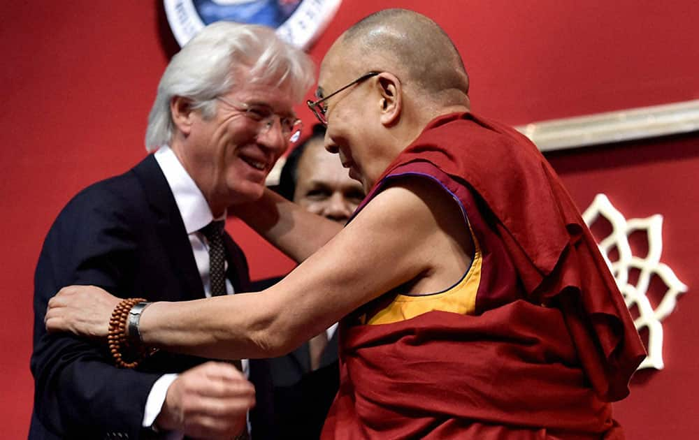 Tibetan Spiritual Leader Dalai Lama greets Holllywood Actor Richard Gere during the Unveiling of the Foundation Plaque of the NIMHANS Integrated Centre for Yoga and special address organized by National Institute of Mental Health and Neuro Sciences(NIMHANS) in Bengaluru.
