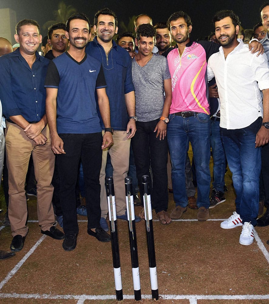 Indian cricketers Ajit Agarkar,Ajinkya Rahane Zaheer Khan, Amol Mujumdar and Rohit Sharma during the opening ceremony of Abhishek Nairs (pink) coaching academy in Mumbai.