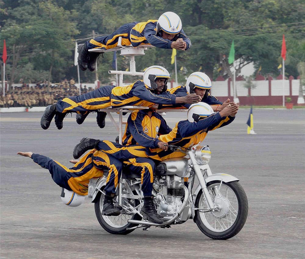 A biker performs during 10th Reunion and 255th Anniversary of Army Service Corps in Bengaluru.
