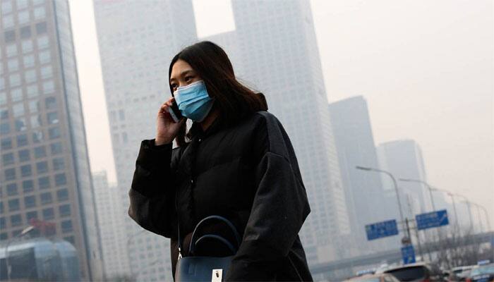 Beijing blanketed by hazardous smog despite red alert