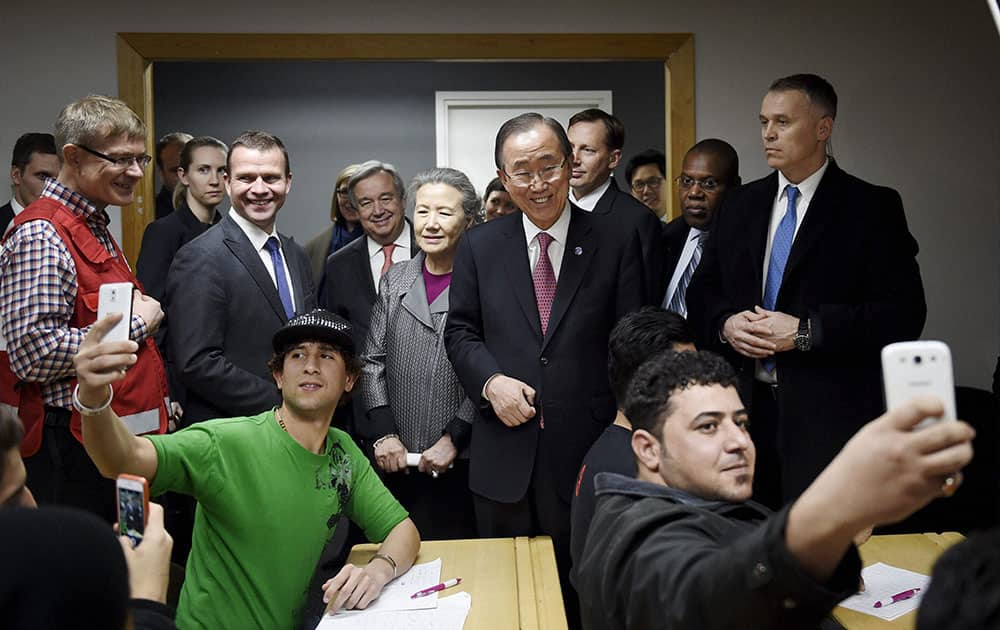 United Nations Secretary General Ban Ki-moon, centre, visits a reception centre for asylum seekers with Finnish Minister of the Interior, Petteri Orpo, second left, in Vantaa, Finland.