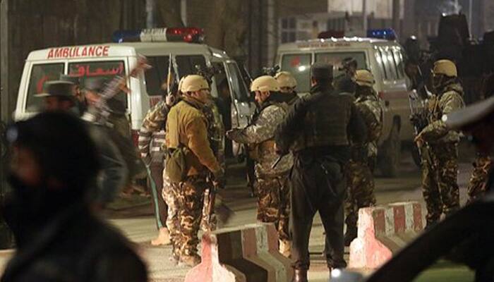 Four Afghan police, one Spaniard killed in Kabul siege