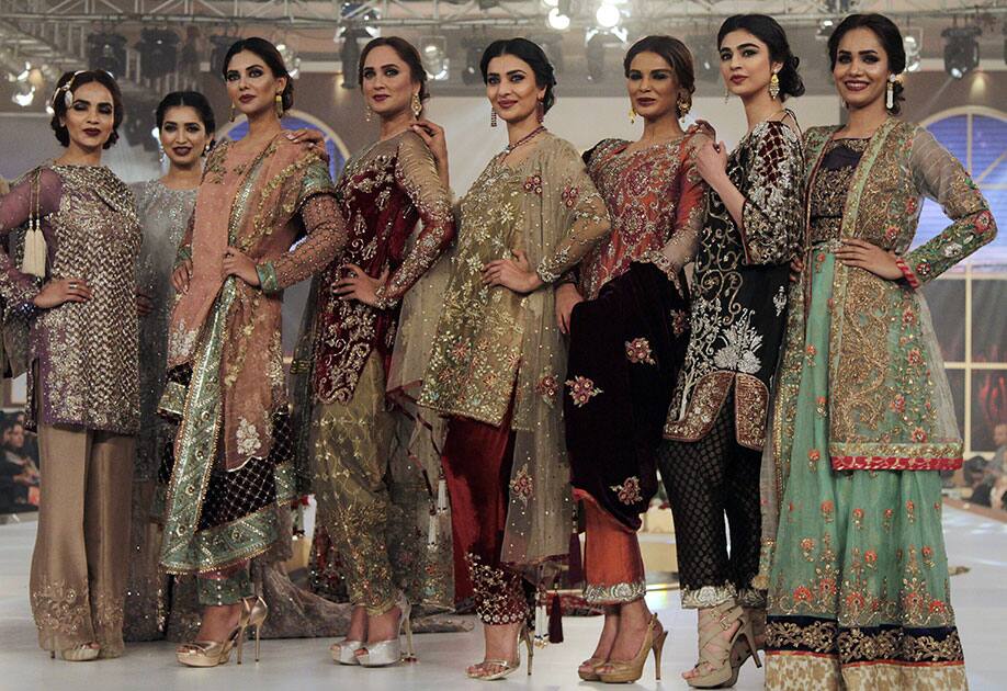 Models present creation of a Pakistani designer Hassan Sheheryar Yasin during Telenor Bridal Couture Week in Lahore, Pakistan.