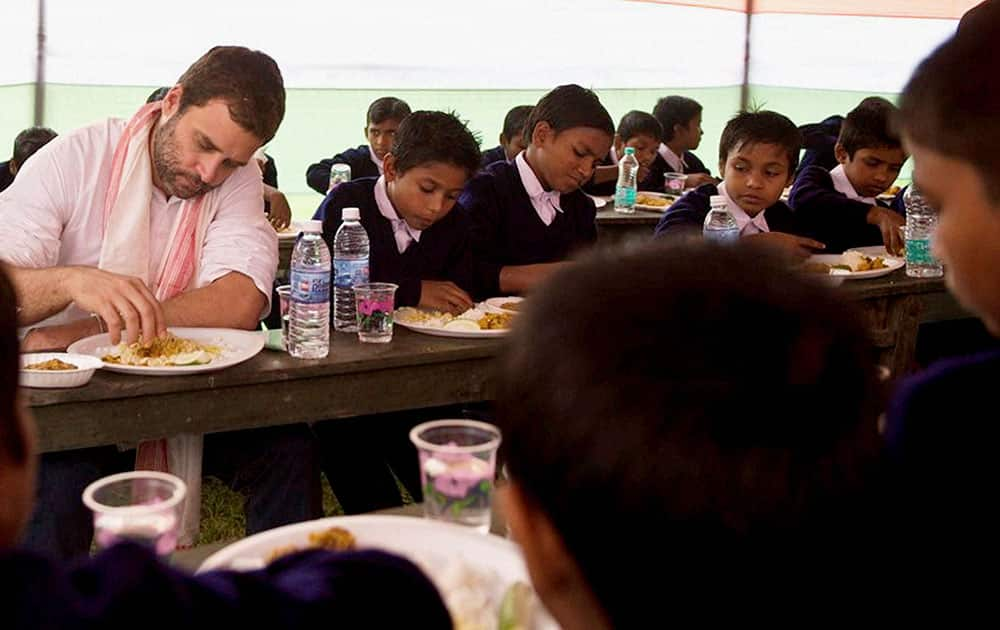 Congress Vice President Rahul Gandhi having meals with School Students at Barpeta in Assam.