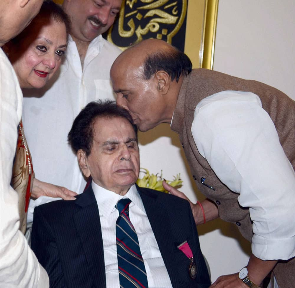 Home Minister Rajnath Singh with Padma Vibhushan bollywood actor Dilip Kumar and his wife Saira Banu during the Padma Vibhushan distribution function at his residence in Mumbai.