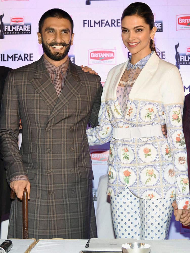 Bollywood actors Ranveer Singh and Deepika Padukone during announcement of date for 61st Filmfare awards in New Delhi.