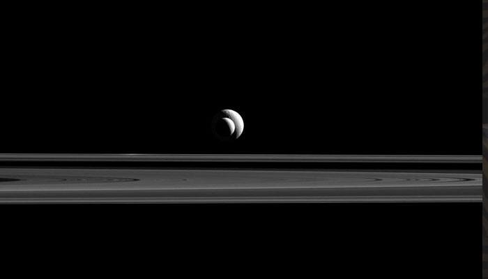 See pic: Saturn&#039;s two moons Enceladus and Tethys pose for NASA&#039;s Cassini!