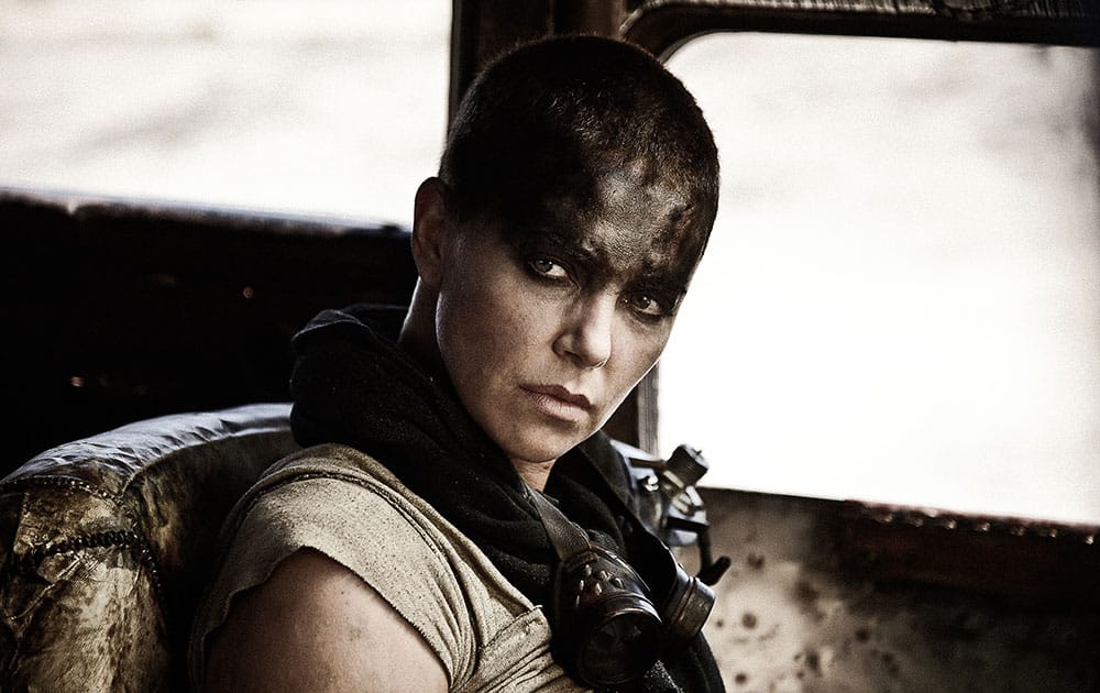 This photo provided by Warner Bros. Pictures shows Charlize Theron as Imperator Furiosa in Warner Bros. Pictures’ and Village Roadshow Pictures’ action adventure film, “Mad Max: Fury Road,