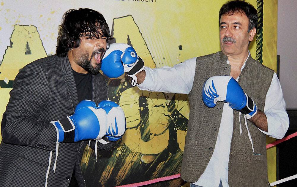 Actor R Madhavan and filmmaker Rajkumar Hirani during the trailer launch of film Saala Khadoos in Mumbai.