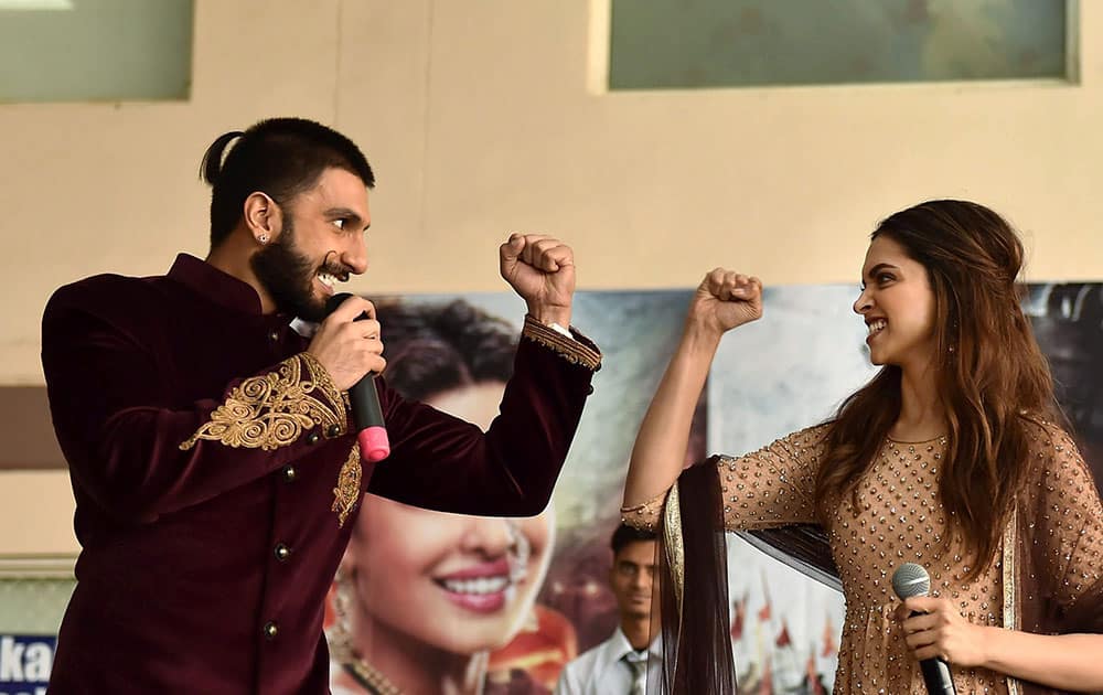 Actors Ranveer Singh and Deepika Padukone during the promotion of their upcoming fim Bajirao Mastani in Lucknow.
