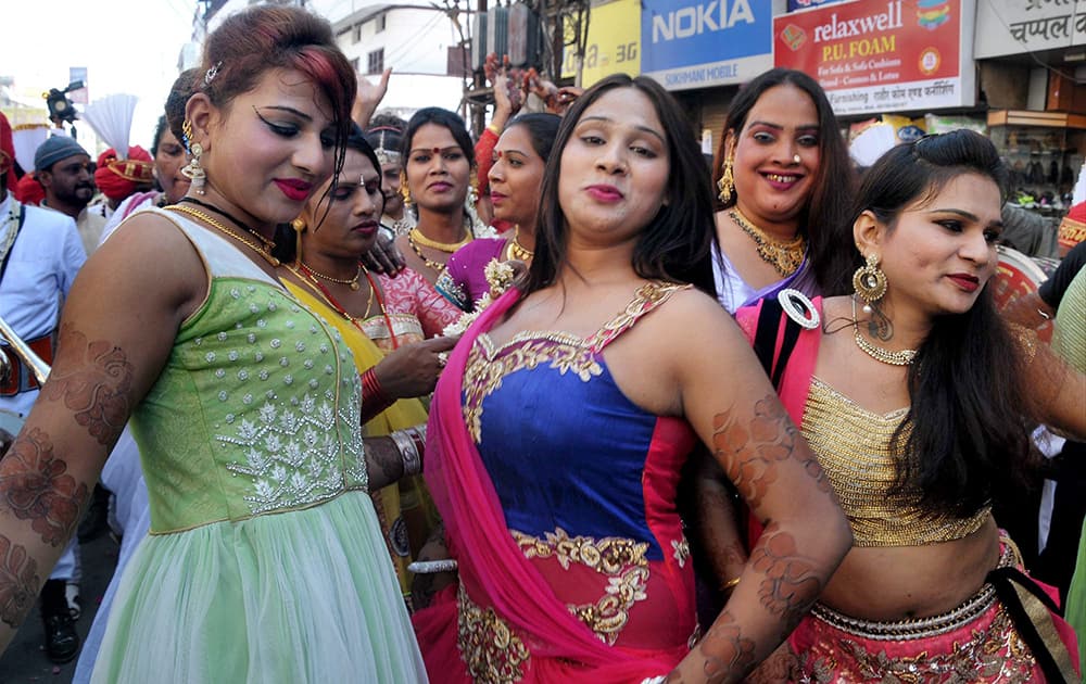 Eunuchs dancing during a procession ahead of Eunuchs National Conference in Indore.