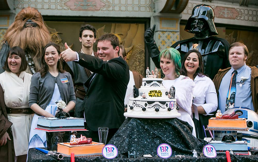 Australian Star Wars fans, Andrew Porters and Caroline Ritter get married at the forecourt of Hollywood's TCL Chinese Theater IMAX in Los Angeles.