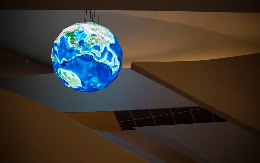 A globe hangs from the roof of the the Museum of Tomorrow in Rio de Janeiro, Brazil.
