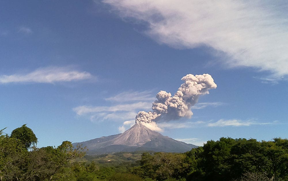 A plume of smoke and ash rise from the Colima volcano, also known as the 