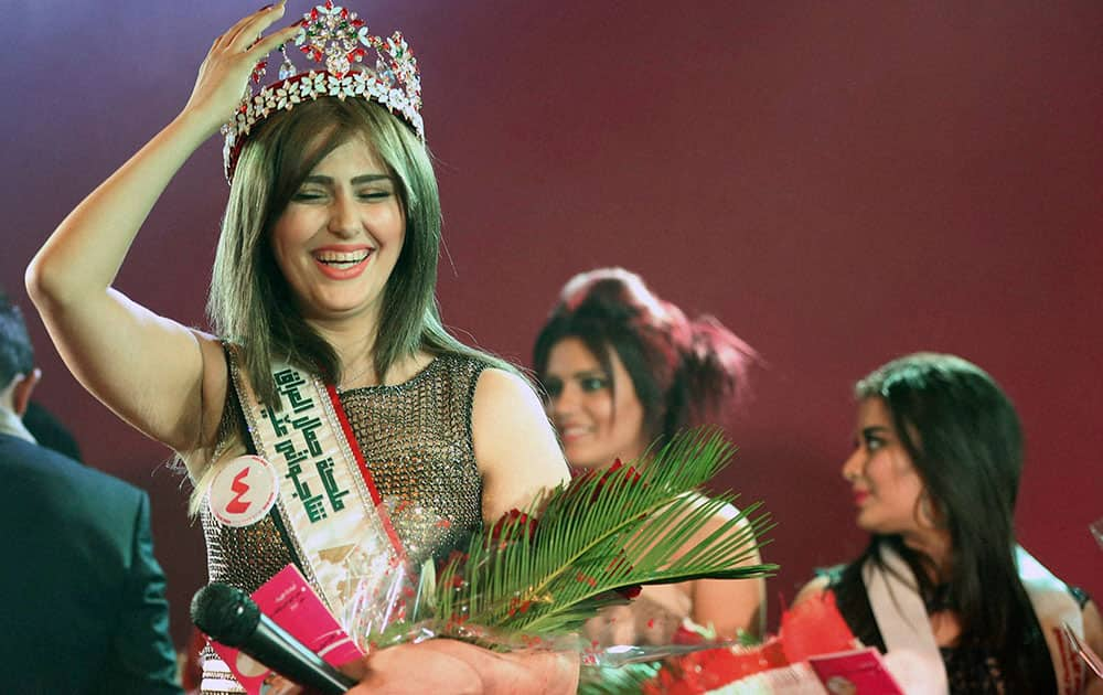 Newly crowned Miss Iraq Shaima Qassim, as she celebrates after being crowned the end of the 2015 Miss Iraq Final, in Baghdad, Iraq.