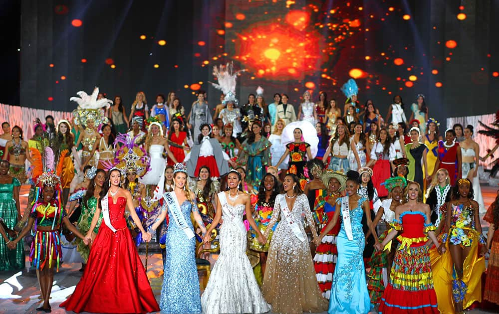 Newly crowned Miss World Mireia Lalaguna Royo from Spain, third from left celebrates with other contestants at the end of the 2015 Miss World Grand Final in Sanya in south China's Hainan province.