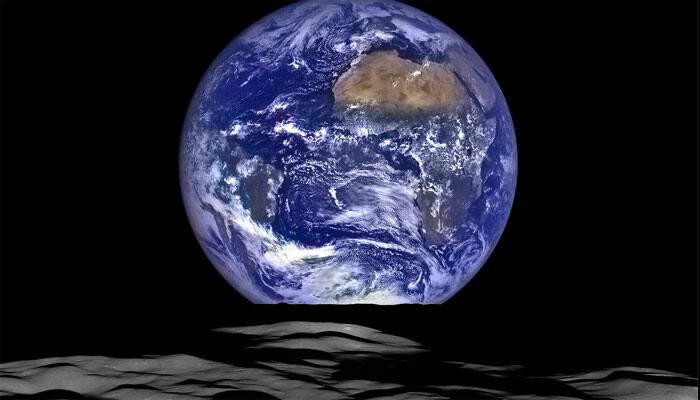 NASA unveils stunning image of earth &#039;rising&#039; over the moon!