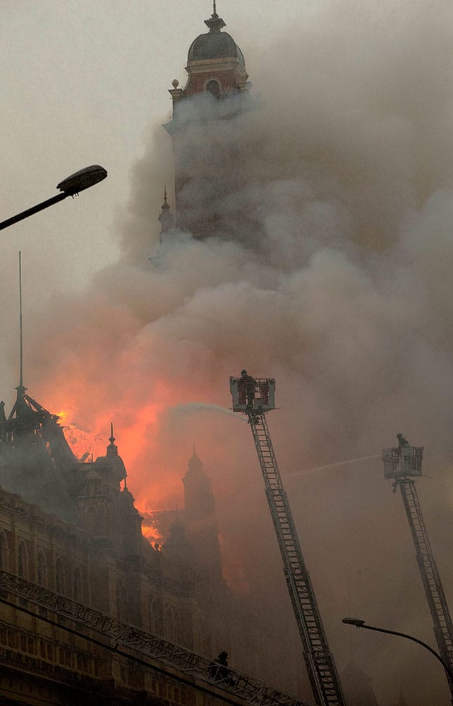 Firefighters work to douse the flames at the Portuguese Language Museum in Sao Paulo, Brazil.