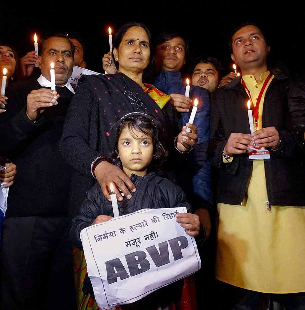 Father of Dec 16 gangrape victim, Badri Singh Pandey and mother Asha during a candle light protest at Jantar Mantar, in New Delhi.