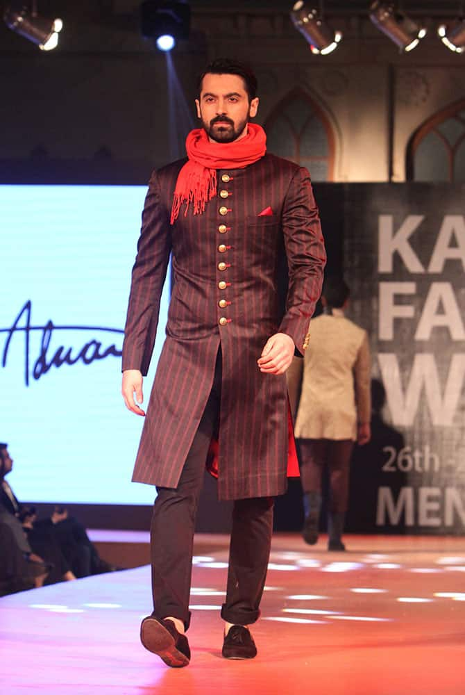 A model presents a creation by Pakistani designer Amir Adnan during the 