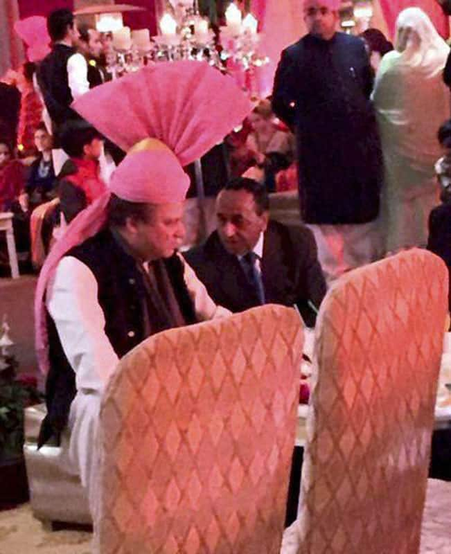 Pakistan Prime Minister Nawaz Sharif wearing pink turban gifted by Prime Minister Narendra Modi, during the wedding of his granddaughter at his residence in Raiwind.