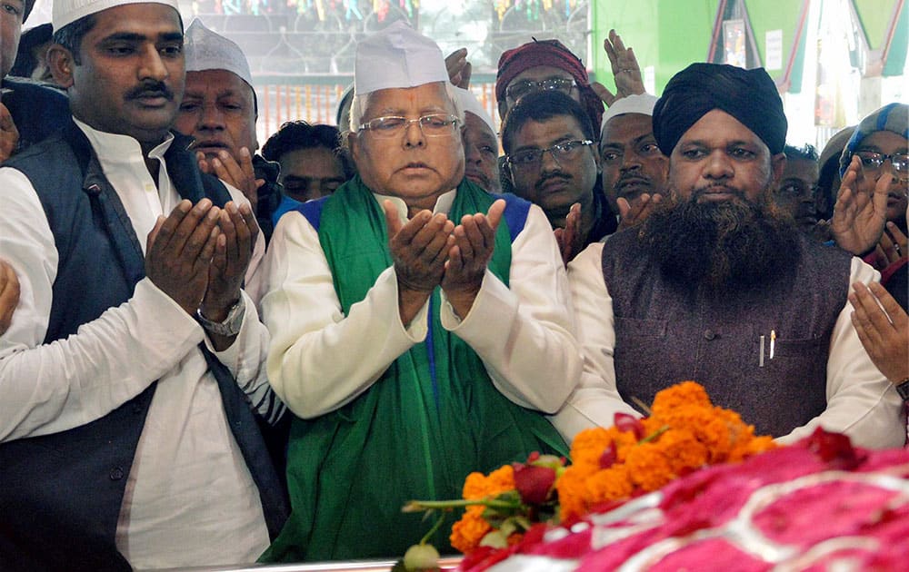 RJD chief Lalu Prasad prays at High Court Mazar during the Urs celebrations in Patna.