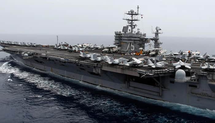 Iranian Navy test fires rockets near US aircraft carrier