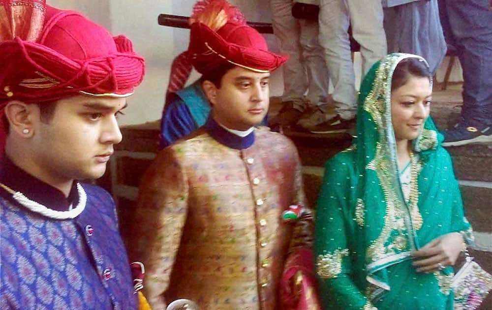 Scion of Scindia dynasty and Congress MP Jyotiraditya Scindia with his wife Priyadarshini Raje Scindia and son Mahanaryaman Scindia attending barat procession during the royal marriage of Holkar dynasty prince Shivaji Raos (Richard) son Yashwant Rao Holkar with Industrialist Vijay Crishna Godrejs daughter Nyrika at Maheshwar in Khargone.