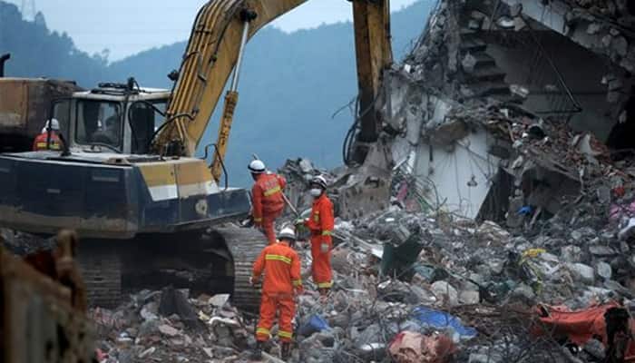 China arrests 11 for deadly landslide, death toll now 12
