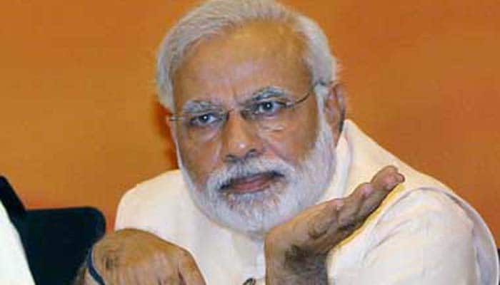 RJD to sue PM Modi for committing fraud