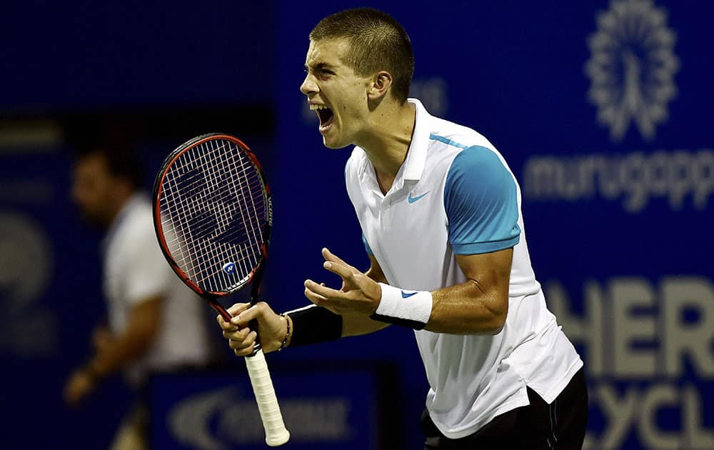 Borna Coric of Croatia reacting after win first set against Marcel Granollers of Spain during their first round match for the ATP Chennai.