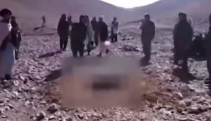 Video Woman Buried Upto Her Neck Stoned To Death For Prostitution In
