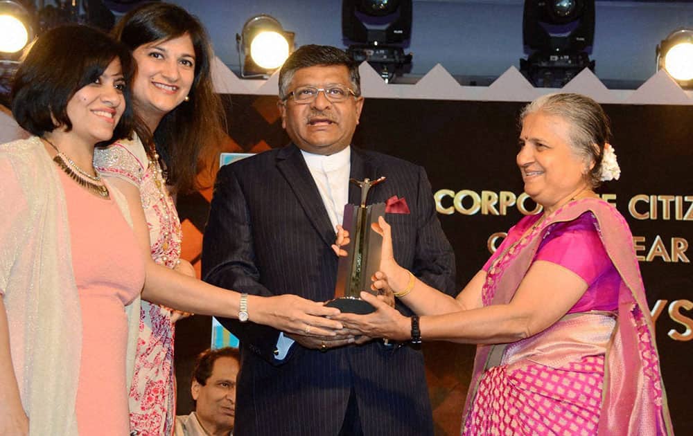 Sudha Murthy receiving award from Union Minister Ravi Shankar Prasad in Mumbai.