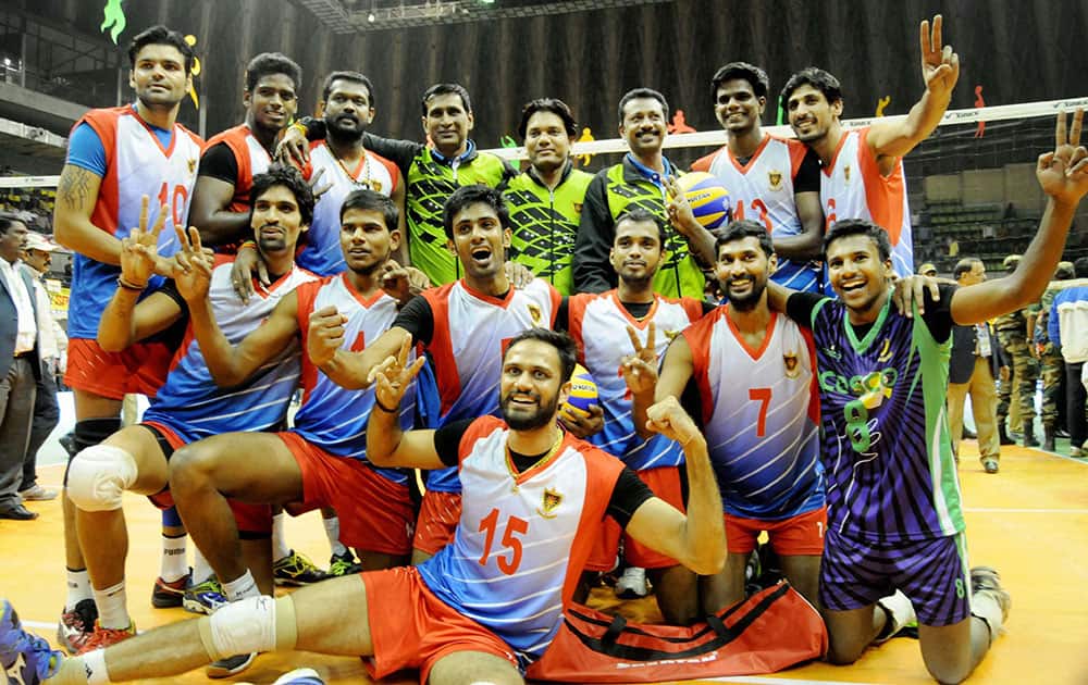 Railways Vollyball team players celebrate after winning match against Kerala in the 64th National Vollyball championship in Bengaluru.