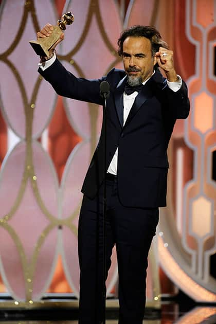 Alejandro G. Inarritu accepts the award for best director for 