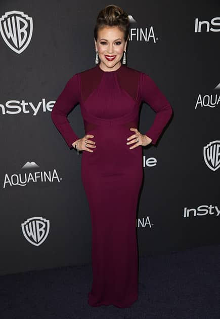 Alyssa Milano arrives at the InStyle and Warner Bros. Golden Globes afterparty at the Beverly Hilton Hotel in Beverly Hills, Calif.