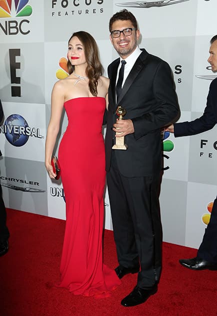 Emmy Rossum and Sam Esmail with the award for best television series - drama for “Mr. Robot” arrive at the NBCUniversal Golden Globes afterparty at the Beverly Hilton Hotel in Beverly Hills, Calif.