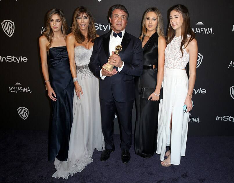 Sophia Stallone, from left, Jennifer Flavin, Sylvester Stallone, winner of the award for best performance by an actor in a supporting role in any motion picture for “Creed”, Sistine Stallone, and Scarlet Stallone arrive at the InStyle and Warner Bros. Golden Globes afterparty at the Beverly Hilton Hotel in Beverly Hills, Calif. 