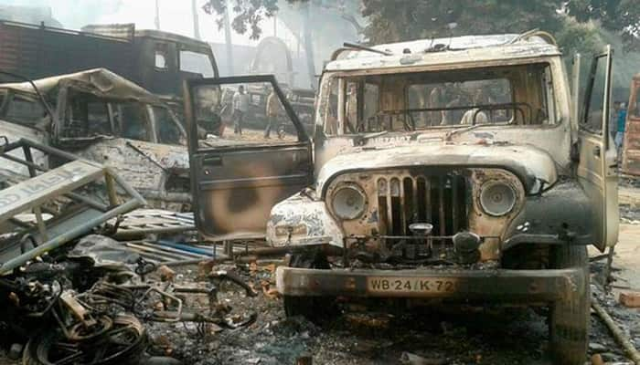 Malda riots: Is Mamata Banerjee playing &#039;vote bank politics&#039;? Should President intervene?