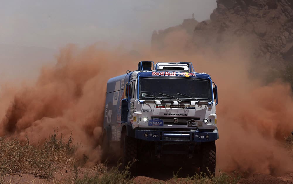 Kamaz truck driver Dimitry Sotnikov and co-drivers Igor Devyatkin and Ruslan Akhmadeev race during the eighth stage of the Dakar Rally in Cafayate, between Salta and Belen, Argentina.