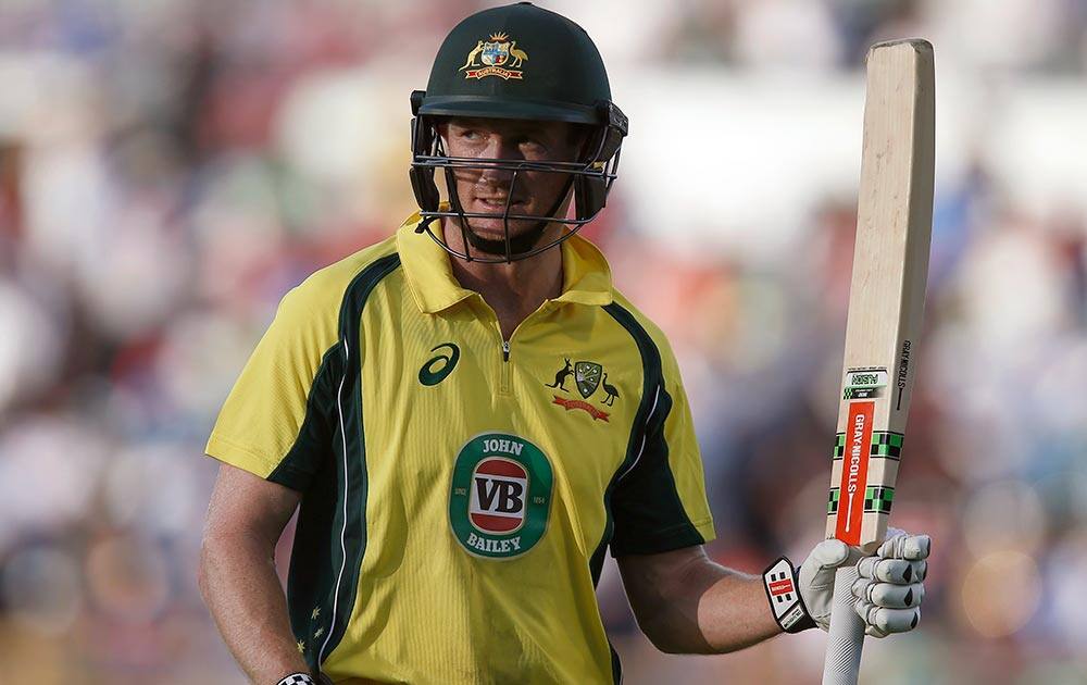 George Bailey acknowledges the crowd after being dismissed for 112 runs during the team's one day international cricket match against India in Perth, Australia.