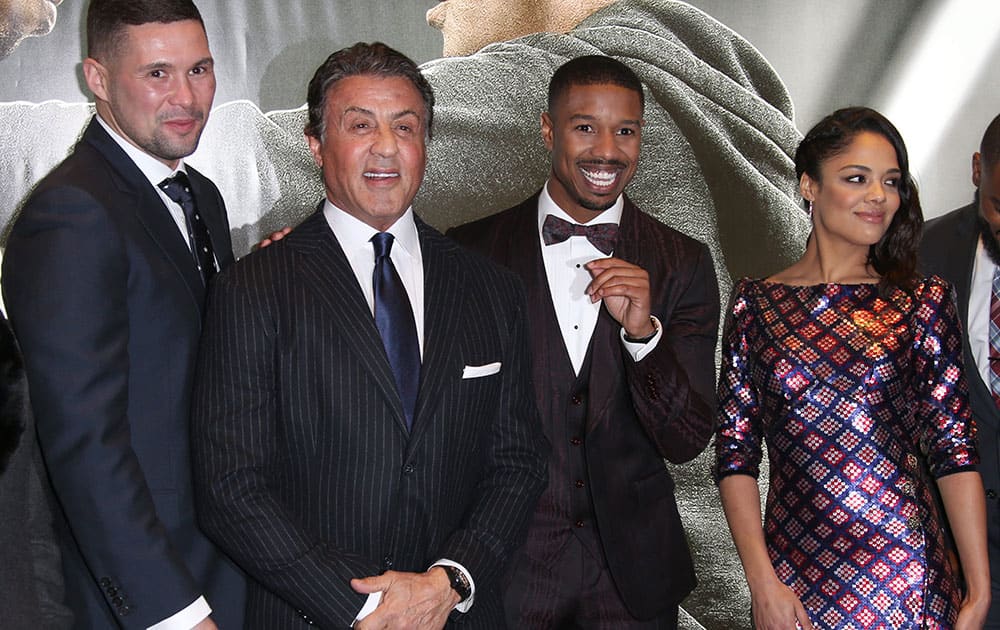 From left, Tony Bellew, Sylvester Stallone, Michael B. Jordan and Tessa Thompson poses for photographers upon arrival at the premiere of the film Creed in London.