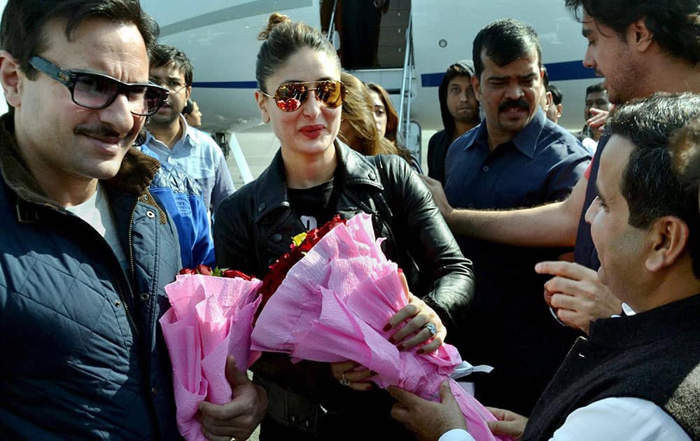 Samajwadi Party MP Dharmendra Yadav receives actor-couple Saif Ali Khan and Kareena for Saifai Mahotsav in Saifai.