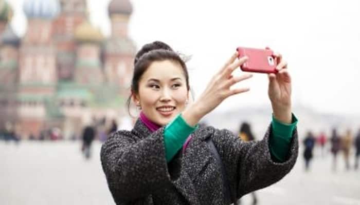 Asian travelers most addicted to their smartphones, Europeans the least: Survey