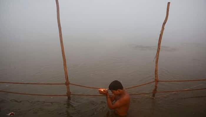 Makar Sankrati: Thousands brave winter for holy dip