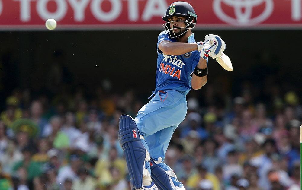 Virat Kohli plays a shot during the 2nd One Day International cricket match between Australia and India in Brisbane, Australia.